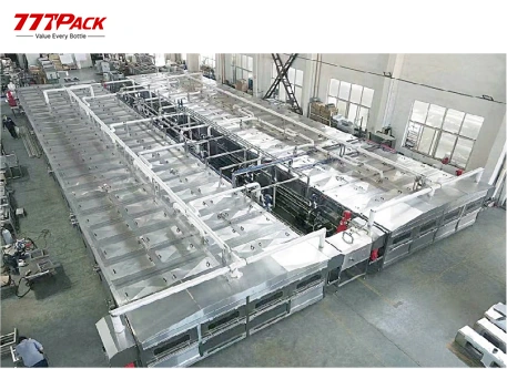Beverage spray tunnel installation illustrating the similar exterior of pasteurizers, bottle coolers and bottle warmers